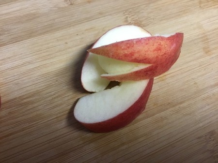 How to Make Apple Bunnies and Flowers - the V shape can be removed and the remaining skin forms the ears