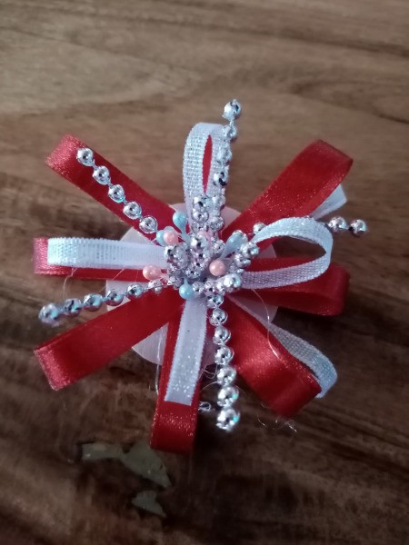 Exploding Fireworks Ribbon Crowns - cut 2 inch strings of the silver beads an glue in the center, add shorter cuts of the bead and some of the craft buds, to look like exploding fireworks