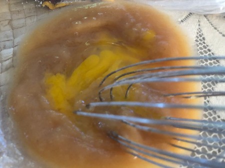 mixing applesauce & eggs
