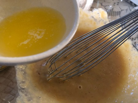drizzling butter into applesauce & eggs