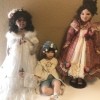 Three porcelain dolls.