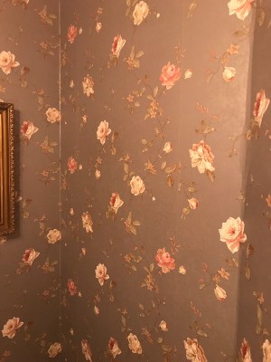 Discontinued York Wallpaper - pink roses on brown or dusky purple background