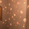 Discontinued York Wallpaper - pink roses on brown or dusky purple background