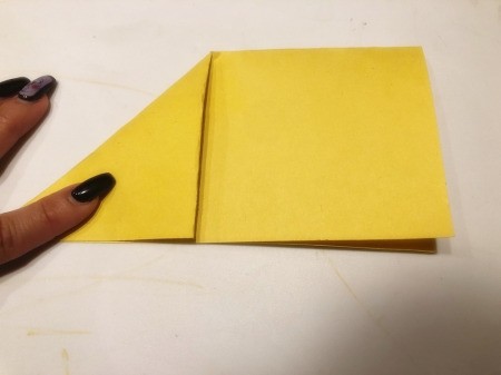 3D Kirigami Paper Stars - fold top left corner down to form a triangle, unfold