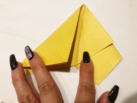 3D Kirigami Paper Stars - fold the upper left down so that it is flush with the spine