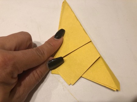 3D Kirigami Paper Stars - fold the triangle on the left side under the right side