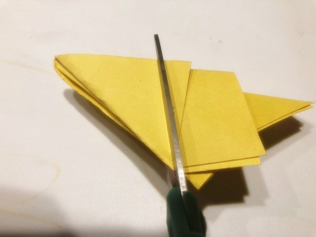 3D Kirigami Paper Stars - cut across and into the triangle on the left side and remove all of the paper on the right side