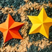 3D Kirigami Paper Stars - two stars, one yellow and one orange