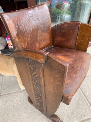 Identifying an Antique or Vintage Oak Chair - oak chair with leather covered back and seat, carving down the sides,  and wooden claw feet