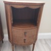 Identifying Round Antique Tables - round two drawer table with a shelf space carved to look like a stage with curtains