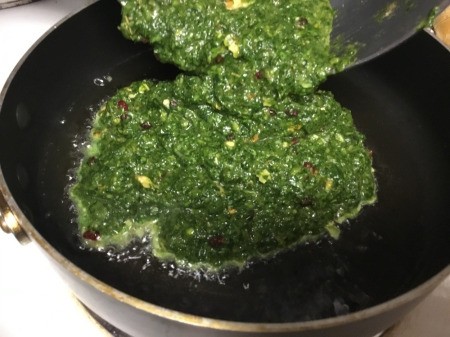 pouring Herb Frittata in pan