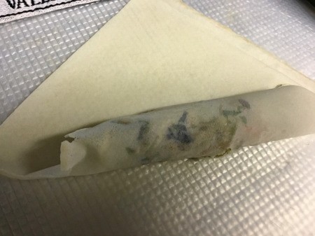 rolled filled wrapper half way