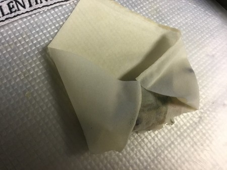 folded corners on filled wrapper
