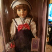 Value of a Collectible Memories Porcelain Doll - doll in sailor outfit