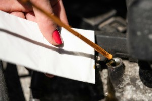 Woman checking DipstickTube