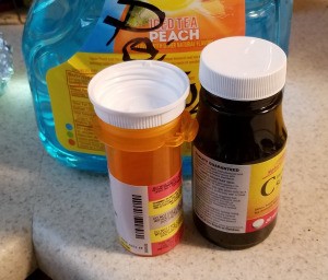 A prescription lid that is the same size as a gallon jug lid.