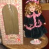 Value of a Brass Key Rose Collection Doll - doll standing next to box