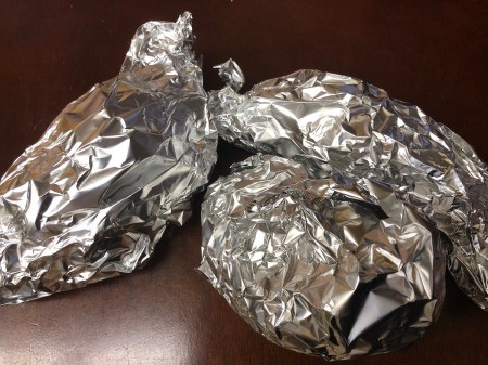 foiled potatoes to bake