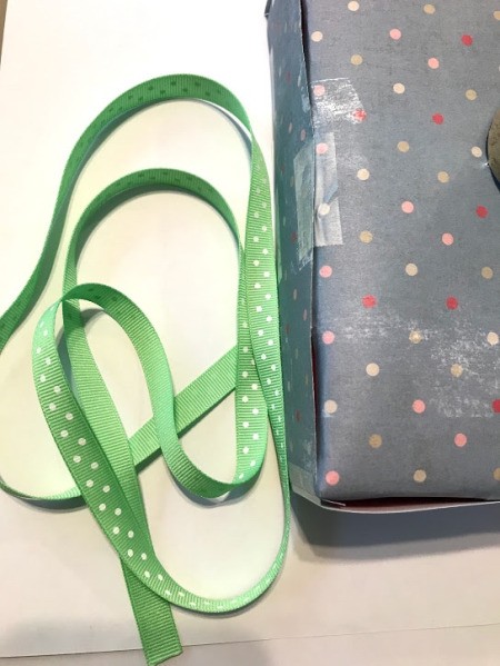 Cardboard Box Play Camera - length of ribbon cut to tape to the sides