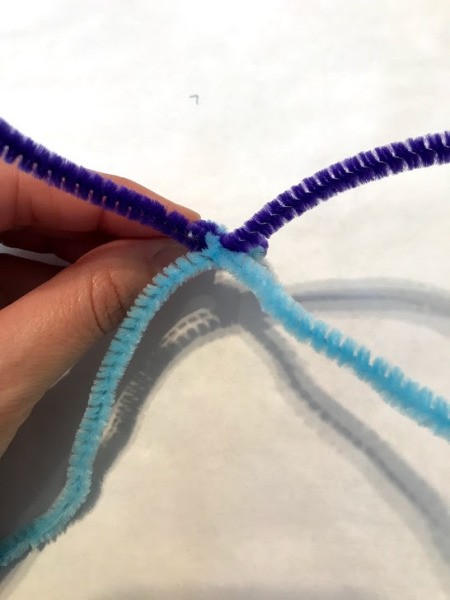 Pipe Cleaner Butterfly Ring  - open the untwisted ends into an X shape