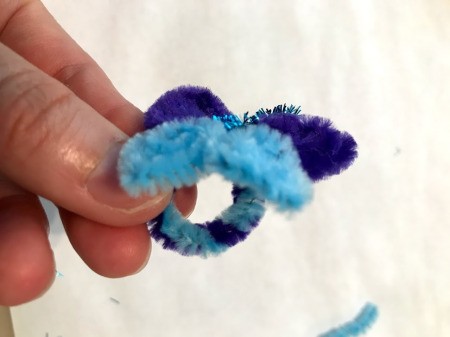 Pipe Cleaner Butterfly Ring - holding by ring to show ring and wings