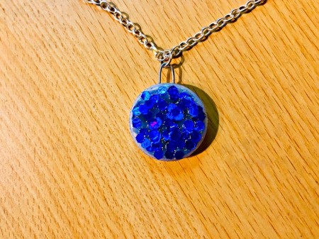 Making a Bottle Cap Glitter Pendant Necklace - allow to dry for a few hours