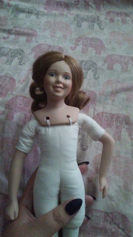 Identifying a MBI Porcelain Doll