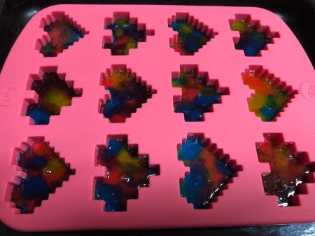 Making Rainbow Lollipops - allow to full cool, pop out and set aside, clean the molds