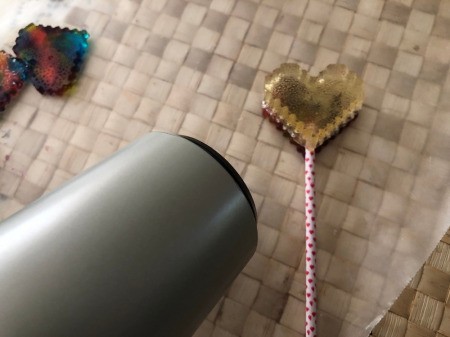 Making Rainbow Lollipops - add the clear side and use the same method