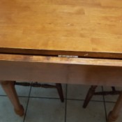 A drop leaf vintage table.