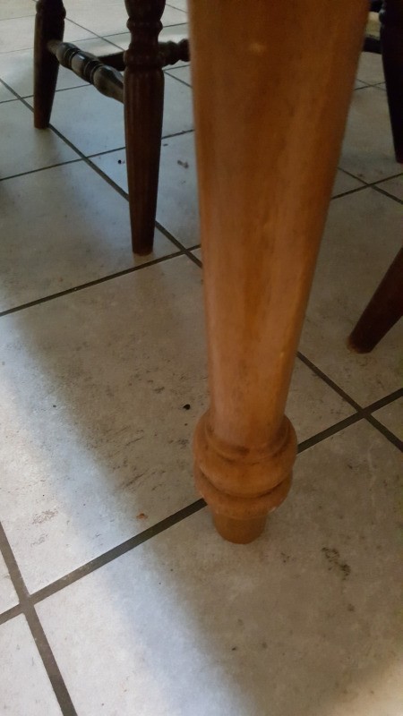 The leg of a vintage table.