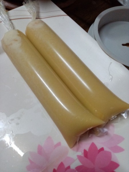 batter poured into plastic wraps for ice pops