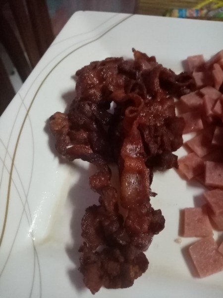 fried bacon on plate