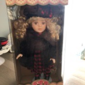 Value of Collector's Choice Porcelain Dolls - doll with curly blonde hair in box