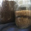 A jar of dried lentils and brown rice.