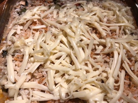 cheese added to casserole