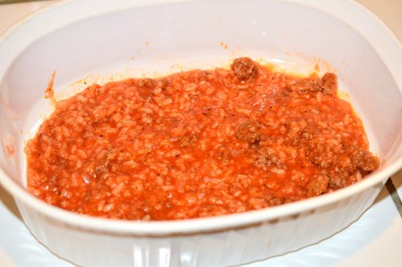sauced ground beef in bottom of casserole pan