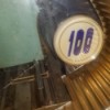 Value of a Seeburg Jukebox - closeup of the emblem with 100 on it