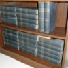 Selling Antique Incomplete Set of Encyclopedia Britannica - volumes on a bookshelf