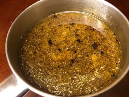 Chicken juices in pan