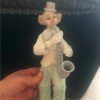 Value of a Leonardo Clown Figurine - muted color sax playing clown