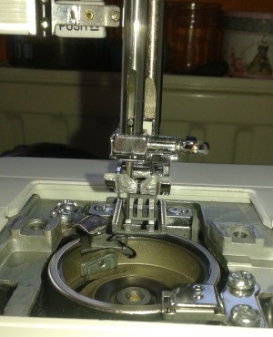 Sewing Machine Not Stitching - photo of the bobbin area and presser foot