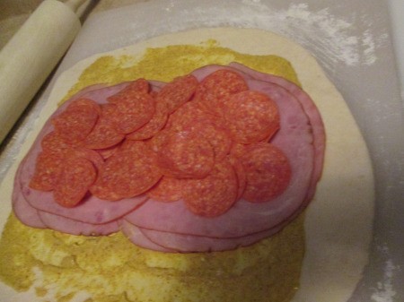 mustard, ham & pepperoni on dough