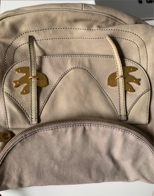 Cleaning Discoloration and Stains on a Leather Bag - light cream/tan bag with stains and noticeable color differences