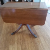 Value of a Brandt Furniture Drop Leaf Table - brass footed drop leaf table