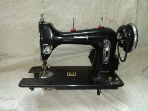 Value of a Necchi Miracle Brand Sewing Machine - black vintage sewing machine