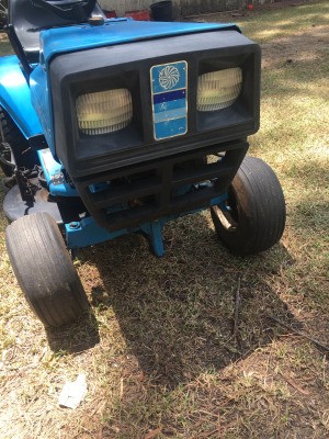 Value of an Old Lowes Yard Tractor by Dynamark - front end of a blue lawn tractor