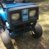 Value of an Old Lowes Yard Tractor by Dynamark - front end of a blue lawn tractor
