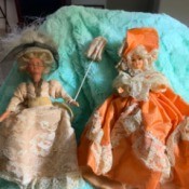 Identifying Dolls with Hard Plastic Bodies - two dolls in fancy dresses one has a parasol