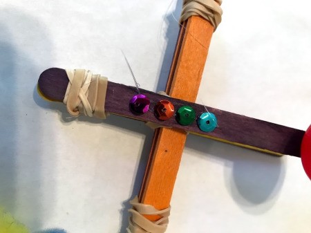 Making a Craft Stick Catapult for Kids - add optional sequin decorations